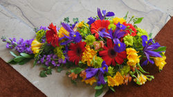 stock-photo-shot-of-flower-and-candle-used-for-a-funeral-1214826982.jpg
